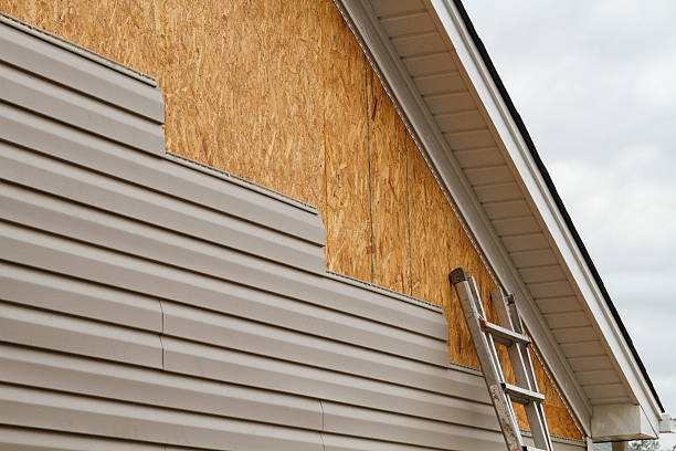 Professional Siding Contractor technician working in Bethany, WV